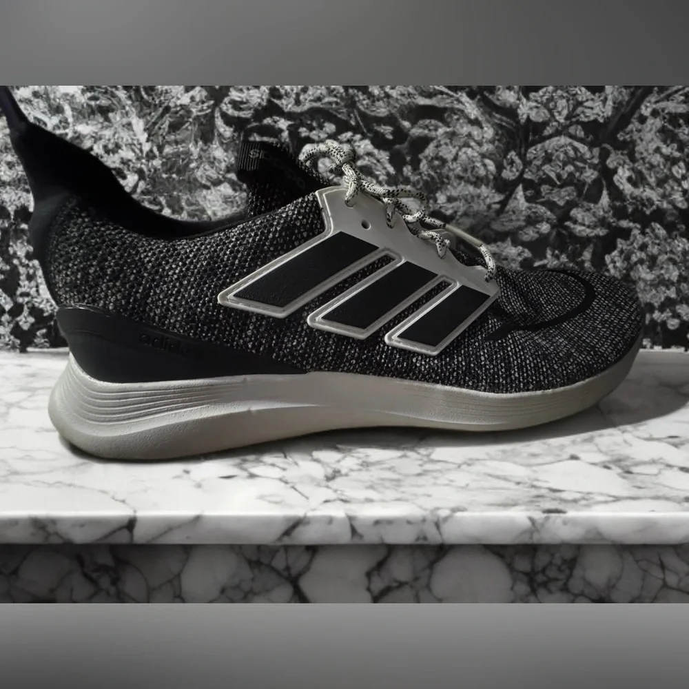 Adidas Black and White Sneakers with Sleek Design